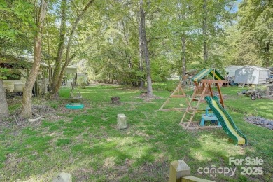 Welcome to your perfect getaway in Twin Harbor on Lake Tillery on The Tillery Tradition Country Club in North Carolina - for sale on GolfHomes.com, golf home, golf lot