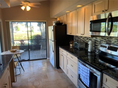 This beautifully renovated two bedroom, two bathroom villa with on Plantation Golf and Country Club in Florida - for sale on GolfHomes.com, golf home, golf lot