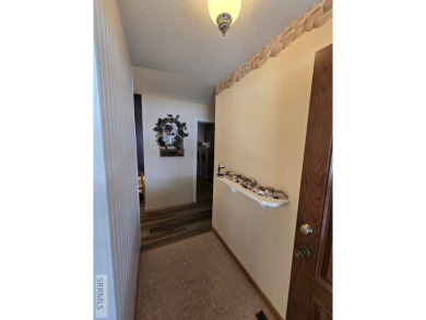 Great home bordering Fremont County Golf course. This home is on on Fremont County Golf Course in Idaho - for sale on GolfHomes.com, golf home, golf lot