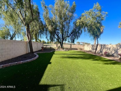This cozy home is situated on Palm Valley Golf Course lot, time on Palm Valley Golf Club  in Arizona - for sale on GolfHomes.com, golf home, golf lot