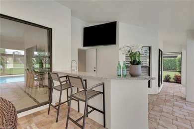 Discover the epitome of luxury living in this very well upgraded on Wildcat Run Golf and Country Club in Florida - for sale on GolfHomes.com, golf home, golf lot