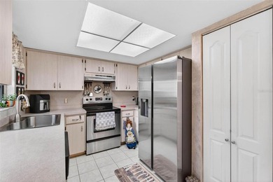 This Highly sought after Ground Floor End Unit Florentine model on On Top Of The World Golf Course in Florida - for sale on GolfHomes.com, golf home, golf lot