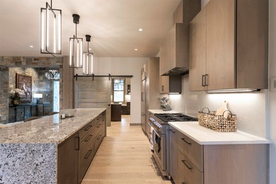 Stunning new western/modern home w/ 4 beds, 4.5 baths offers a on Stock Farm Club in Montana - for sale on GolfHomes.com, golf home, golf lot