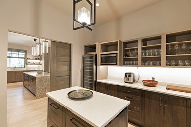 Stunning new western/modern home w/ 4 beds, 4.5 baths offers a on Stock Farm Club in Montana - for sale on GolfHomes.com, golf home, golf lot