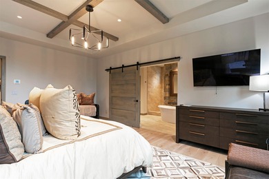 Stunning new western/modern home w/ 4 beds, 4.5 baths offers a on Stock Farm Club in Montana - for sale on GolfHomes.com, golf home, golf lot
