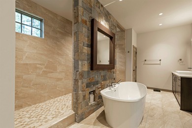 Stunning new western/modern home w/ 4 beds, 4.5 baths offers a on Stock Farm Club in Montana - for sale on GolfHomes.com, golf home, golf lot