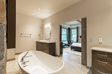 Stunning new western/modern home w/ 4 beds, 4.5 baths offers a on Stock Farm Club in Montana - for sale on GolfHomes.com, golf home, golf lot