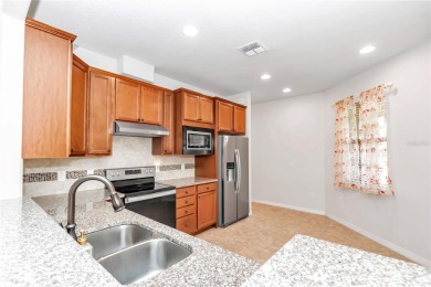 This exceptional two-story garden home, located in Del Webb's on Stone Creek Golf Club in Florida - for sale on GolfHomes.com, golf home, golf lot