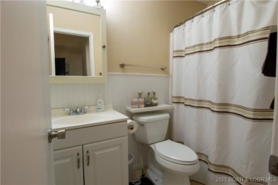 Check out this gem.  The iconic Tan Tar A Estates neighbors on The Oaks Golf Course in Missouri - for sale on GolfHomes.com, golf home, golf lot