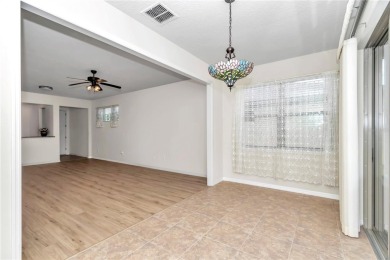 This exceptional two-story garden home, located in Del Webb's on Stone Creek Golf Club in Florida - for sale on GolfHomes.com, golf home, golf lot