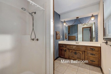 3839 N Stewart offers a spacious 3 bed, 2.5 bath split-level on Bill and Payne Stewart Golf Course  in Missouri - for sale on GolfHomes.com, golf home, golf lot