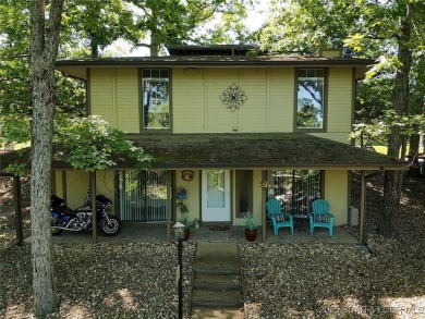 Check out this gem.  The iconic Tan Tar A Estates neighbors on The Oaks Golf Course in Missouri - for sale on GolfHomes.com, golf home, golf lot