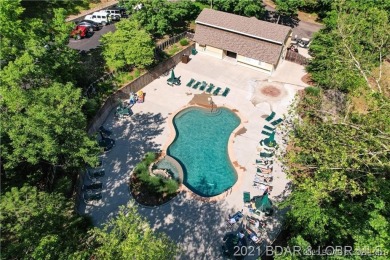 Check out this gem.  The iconic Tan Tar A Estates neighbors on The Oaks Golf Course in Missouri - for sale on GolfHomes.com, golf home, golf lot