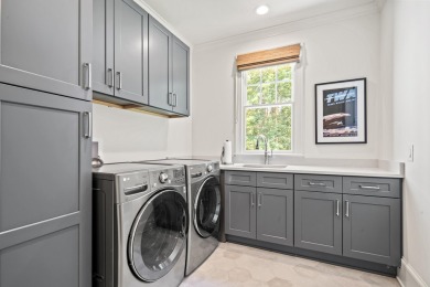 Remodeled home located on the award winning Great Waters Golf on Great Waters Course At Reynolds Plantation in Georgia - for sale on GolfHomes.com, golf home, golf lot