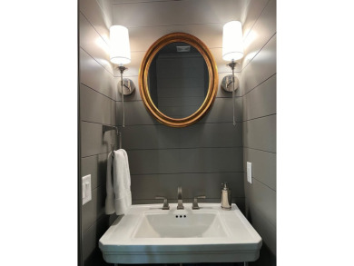 Remodeled home located on the award winning Great Waters Golf on Great Waters Course At Reynolds Plantation in Georgia - for sale on GolfHomes.com, golf home, golf lot