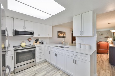 Welcome home to this beautiful condo located in the heart of the on Falcon Watch Golf Club in Florida - for sale on GolfHomes.com, golf home, golf lot