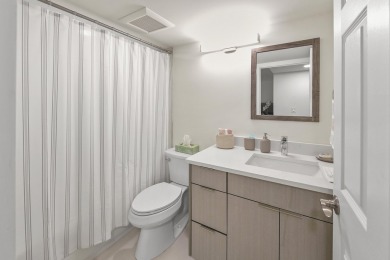 This completely remodeled first-floor residence in the Promenade on Boca Pointe Country Club in Florida - for sale on GolfHomes.com, golf home, golf lot