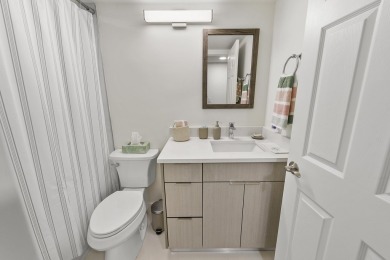 This completely remodeled first-floor residence in the Promenade on Boca Pointe Country Club in Florida - for sale on GolfHomes.com, golf home, golf lot