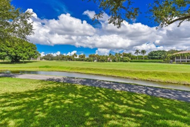 This completely remodeled first-floor residence in the Promenade on Boca Pointe Country Club in Florida - for sale on GolfHomes.com, golf home, golf lot