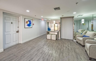 This completely remodeled first-floor residence in the Promenade on Boca Pointe Country Club in Florida - for sale on GolfHomes.com, golf home, golf lot