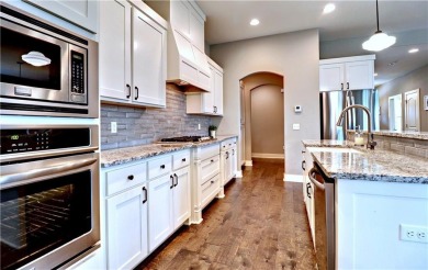 Welcome to this charming  spacious 4-bedroom, 4-bath home in a on Stonebridge Meadows Golf Club in Arkansas - for sale on GolfHomes.com, golf home, golf lot