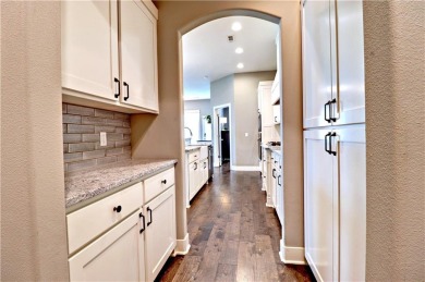 Welcome to this charming  spacious 4-bedroom, 4-bath home in a on Stonebridge Meadows Golf Club in Arkansas - for sale on GolfHomes.com, golf home, golf lot