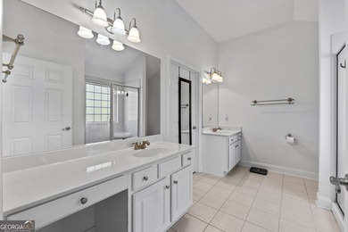 Welcome to this stunning 3-bedroom, 3-bath home with a private on Canongate At Heron Bay in Georgia - for sale on GolfHomes.com, golf home, golf lot