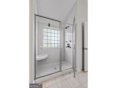 Welcome to this stunning 3-bedroom, 3-bath home with a private on Canongate At Heron Bay in Georgia - for sale on GolfHomes.com, golf home, golf lot