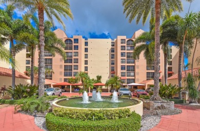 This completely remodeled first-floor residence in the Promenade on Boca Pointe Country Club in Florida - for sale on GolfHomes.com, golf home, golf lot