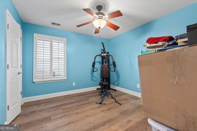 Welcome to this stunning 3-bedroom, 3-bath home with a private on Canongate At Heron Bay in Georgia - for sale on GolfHomes.com, golf home, golf lot