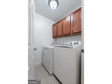 Welcome to this stunning 3-bedroom, 3-bath home with a private on Canongate At Heron Bay in Georgia - for sale on GolfHomes.com, golf home, golf lot