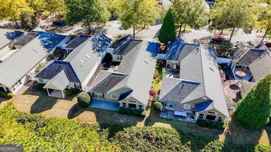 Welcome to this stunning 3-bedroom, 3-bath home with a private on Canongate At Heron Bay in Georgia - for sale on GolfHomes.com, golf home, golf lot