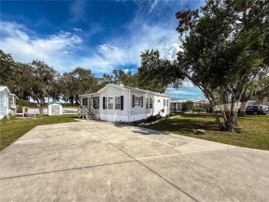 NO LOT RENT, it is a deeded lot, 2 bedrooms 1 Bath. A/C 2018 and on Glen Lakes Country Club in Florida - for sale on GolfHomes.com, golf home, golf lot