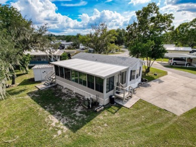 NO LOT RENT, it is a deeded lot, 2 bedrooms 1 Bath. A/C 2018 and on Glen Lakes Country Club in Florida - for sale on GolfHomes.com, golf home, golf lot