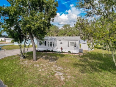 NO LOT RENT, it is a deeded lot, 2 bedrooms 1 Bath. A/C 2018 and on Glen Lakes Country Club in Florida - for sale on GolfHomes.com, golf home, golf lot