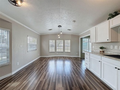 NO LOT RENT, it is a deeded lot, 2 bedrooms 1 Bath. A/C 2018 and on Glen Lakes Country Club in Florida - for sale on GolfHomes.com, golf home, golf lot
