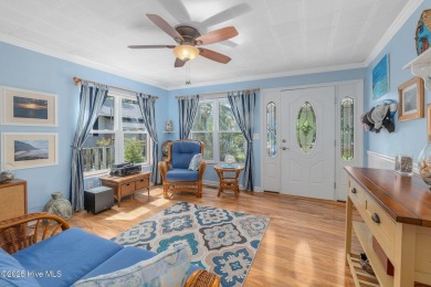 Welcome to this beautifully maintained 4-bedroom, 2-bath coastal on The Country Club of the Crystal Coast in North Carolina - for sale on GolfHomes.com, golf home, golf lot