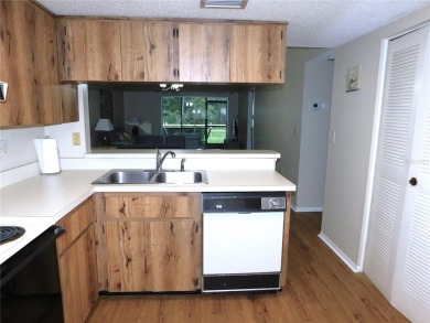 Just what you have been waiting for....! FIRST floor, pet on East Lake Woodlands Country Club in Florida - for sale on GolfHomes.com, golf home, golf lot