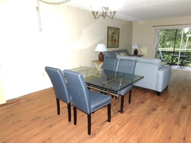 Just what you have been waiting for....! FIRST floor, pet on East Lake Woodlands Country Club in Florida - for sale on GolfHomes.com, golf home, golf lot