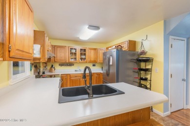 Welcome to this beautifully maintained 4-bedroom, 2-bath coastal on The Country Club of the Crystal Coast in North Carolina - for sale on GolfHomes.com, golf home, golf lot