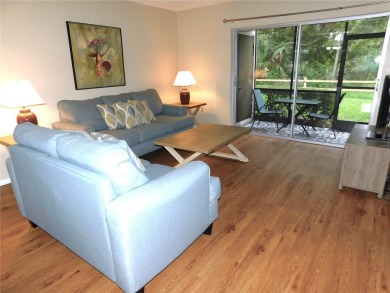 Just what you have been waiting for....! FIRST floor, pet on East Lake Woodlands Country Club in Florida - for sale on GolfHomes.com, golf home, golf lot