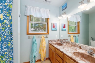 Welcome to this beautifully maintained 4-bedroom, 2-bath coastal on The Country Club of the Crystal Coast in North Carolina - for sale on GolfHomes.com, golf home, golf lot