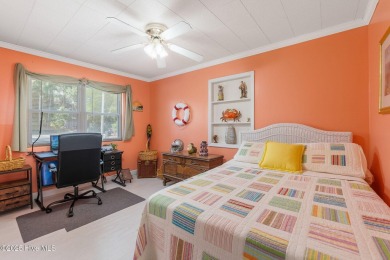Welcome to this beautifully maintained 4-bedroom, 2-bath coastal on The Country Club of the Crystal Coast in North Carolina - for sale on GolfHomes.com, golf home, golf lot