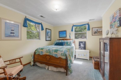 Welcome to this beautifully maintained 4-bedroom, 2-bath coastal on The Country Club of the Crystal Coast in North Carolina - for sale on GolfHomes.com, golf home, golf lot