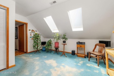 Welcome to this beautifully maintained 4-bedroom, 2-bath coastal on The Country Club of the Crystal Coast in North Carolina - for sale on GolfHomes.com, golf home, golf lot