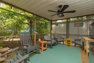 Welcome to this beautifully maintained 4-bedroom, 2-bath coastal on The Country Club of the Crystal Coast in North Carolina - for sale on GolfHomes.com, golf home, golf lot