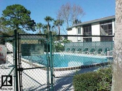 Just what you have been waiting for....! FIRST floor, pet on East Lake Woodlands Country Club in Florida - for sale on GolfHomes.com, golf home, golf lot