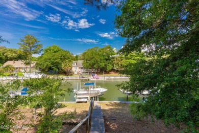 Welcome to this beautifully maintained 4-bedroom, 2-bath coastal on The Country Club of the Crystal Coast in North Carolina - for sale on GolfHomes.com, golf home, golf lot
