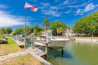 Welcome to this beautifully maintained 4-bedroom, 2-bath coastal on The Country Club of the Crystal Coast in North Carolina - for sale on GolfHomes.com, golf home, golf lot
