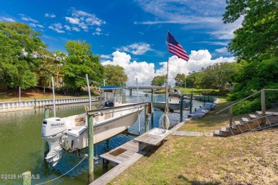 Welcome to this beautifully maintained 4-bedroom, 2-bath coastal on The Country Club of the Crystal Coast in North Carolina - for sale on GolfHomes.com, golf home, golf lot